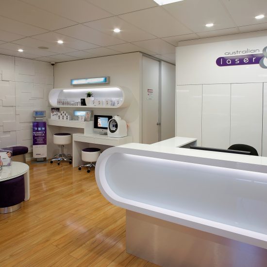 Custom joinery, 2 pac finish, white 2 pac, retail design, commercial design, custom coffee table, custom stool, backlit shelving, reception desk design, cabinet design, bench seating, custom bench seating, product display, 3D wall panels