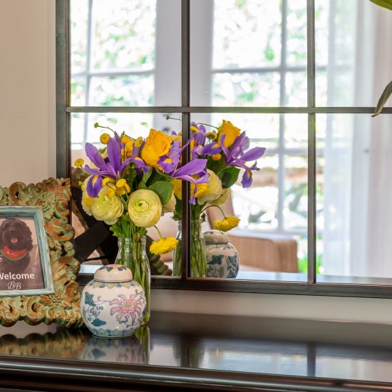 Hamptons entry, panelled mirror, black console table, entry decoration